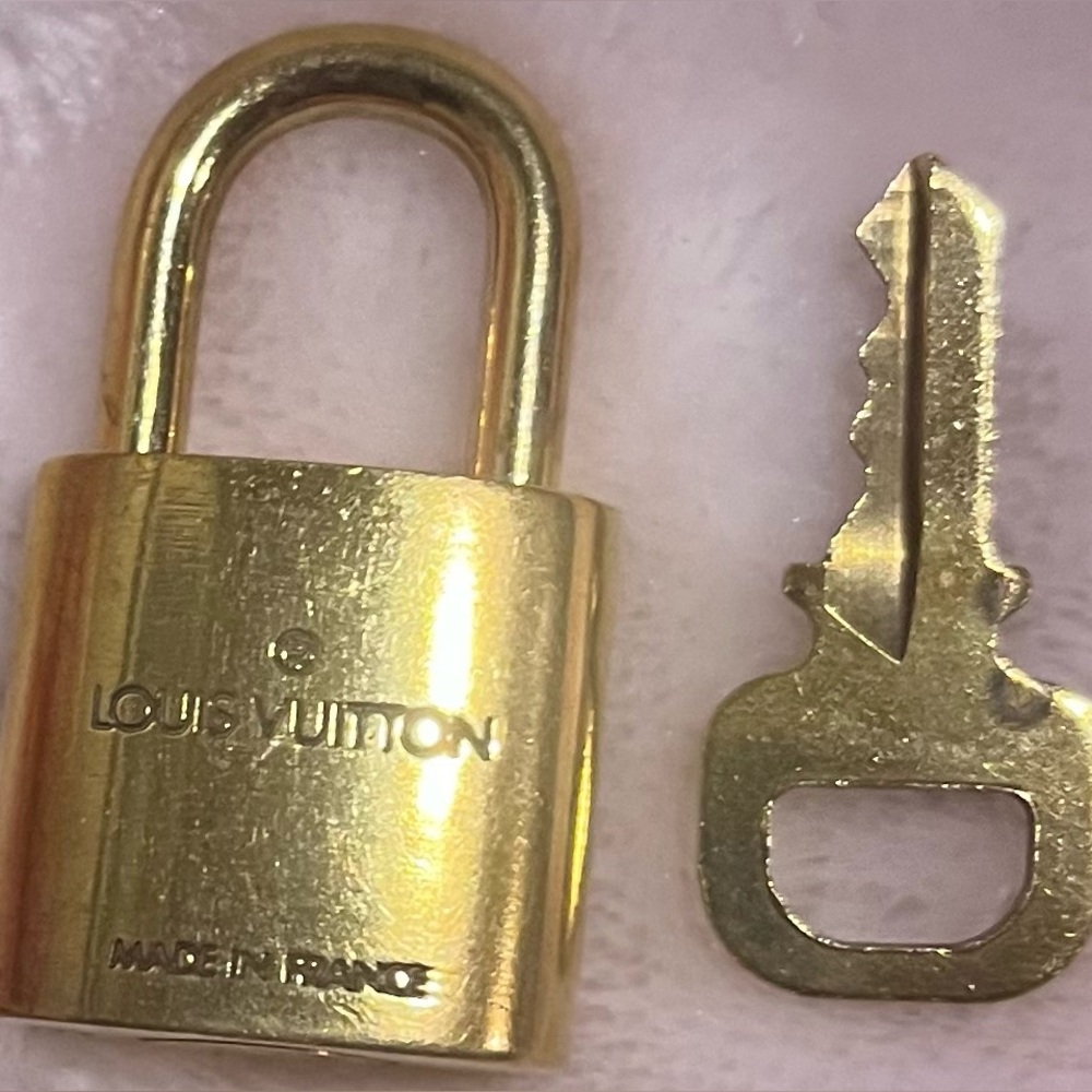Louis Vuitton padlock and key